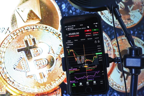 Ethereum and Bitcoin coins placed side by side