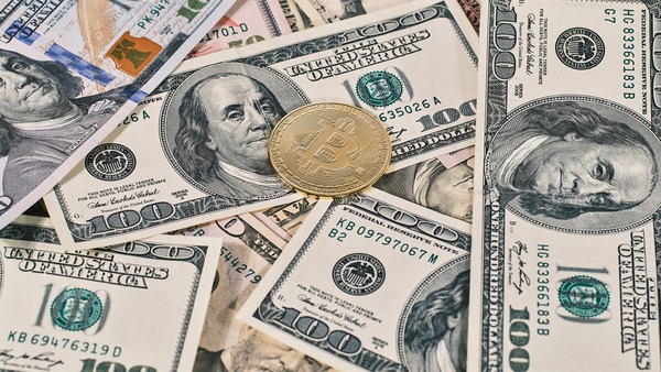 Ethereum coin next to a Tether USDT token