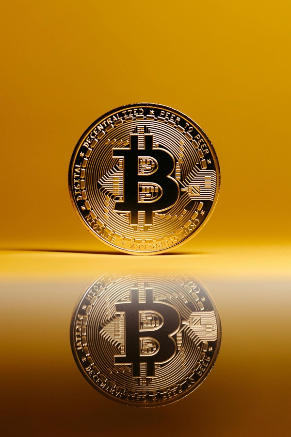 Solana SOL coin next to an Ethereum coin